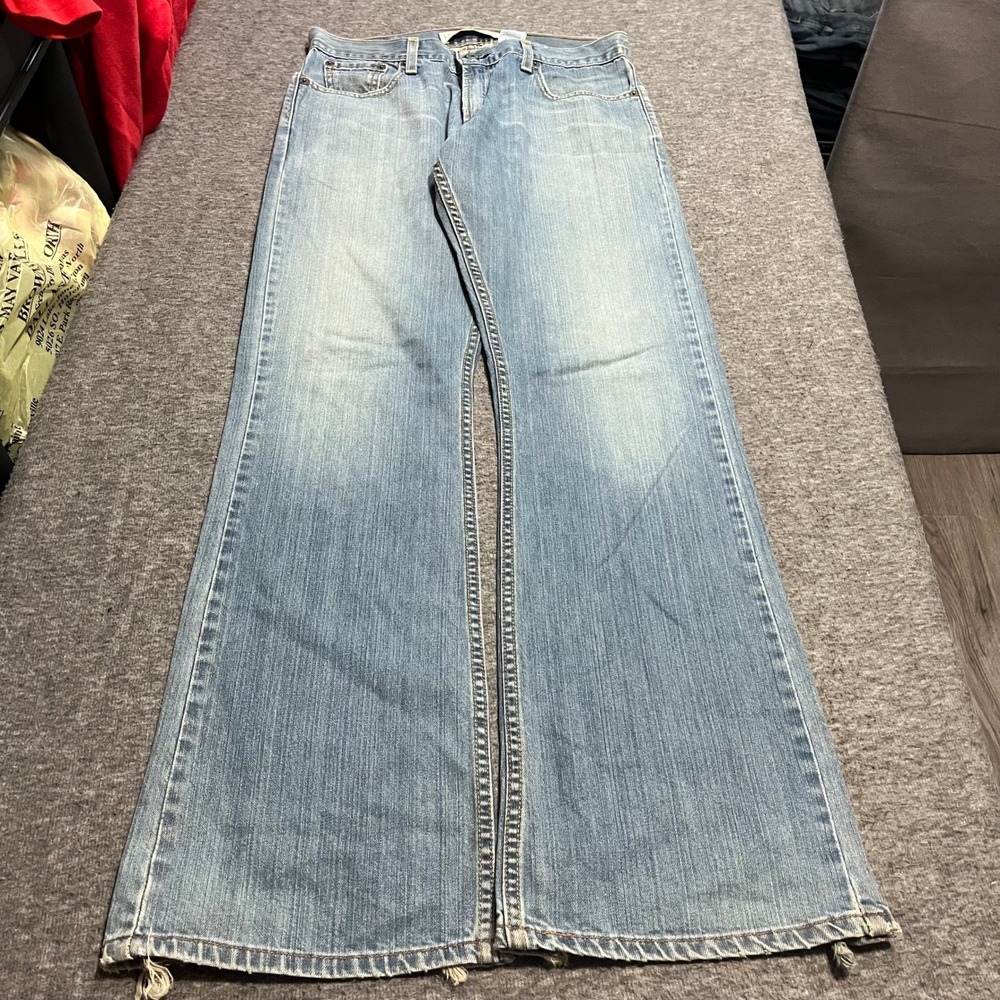 Levis 527 Low Boot Cut Jeans Mens 30x32 Light Wash Distressed Denim